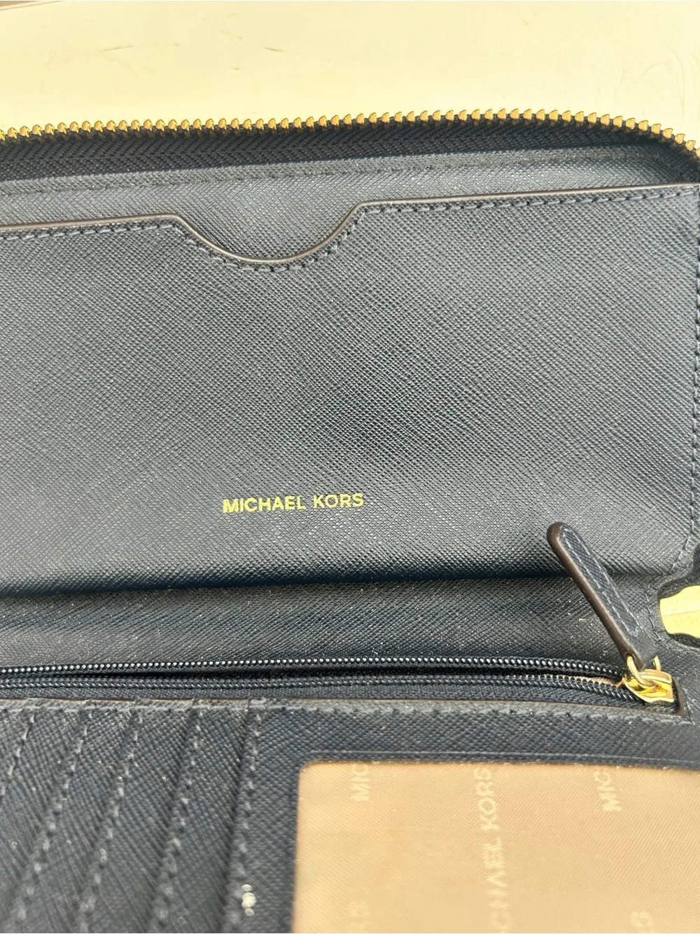 Michael Kors White & Navy Signature Logo Wristlet with Gold Plate